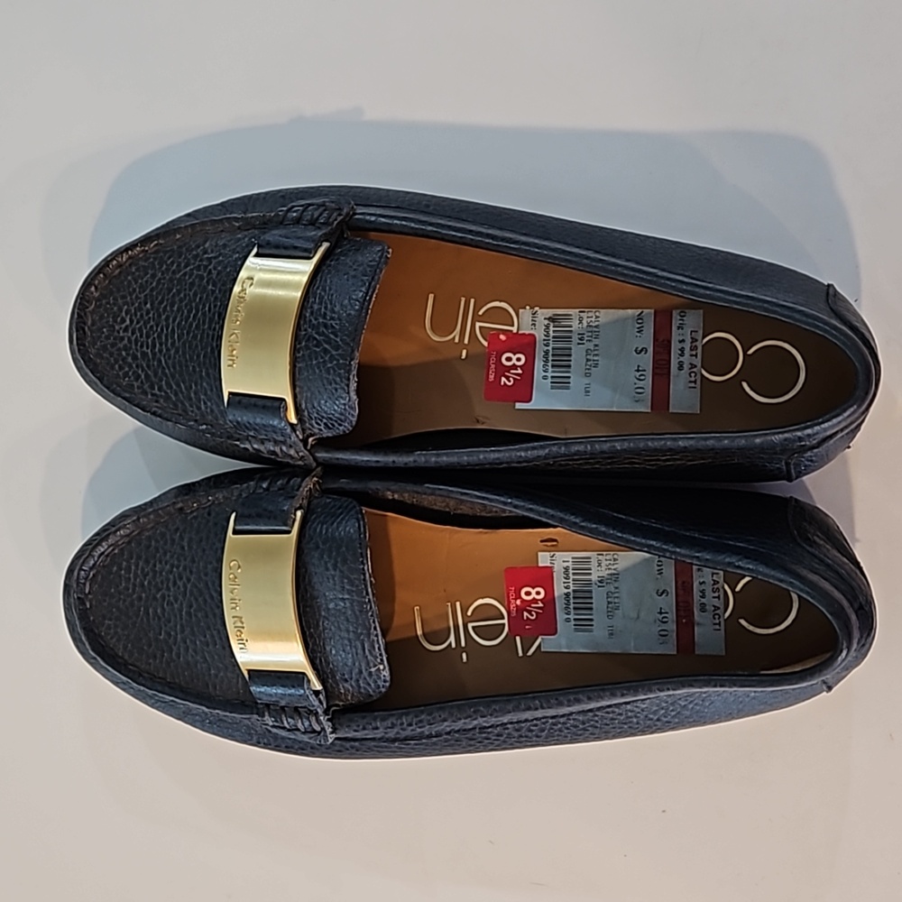 Women's size 8.5M, navy blue Calvin Klein loafers
